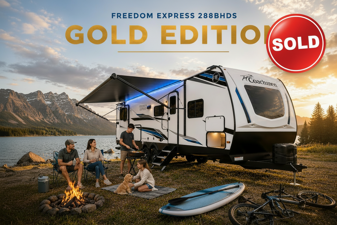 Freedom Express 288BHDS Gold Edition family caravan beside a lake