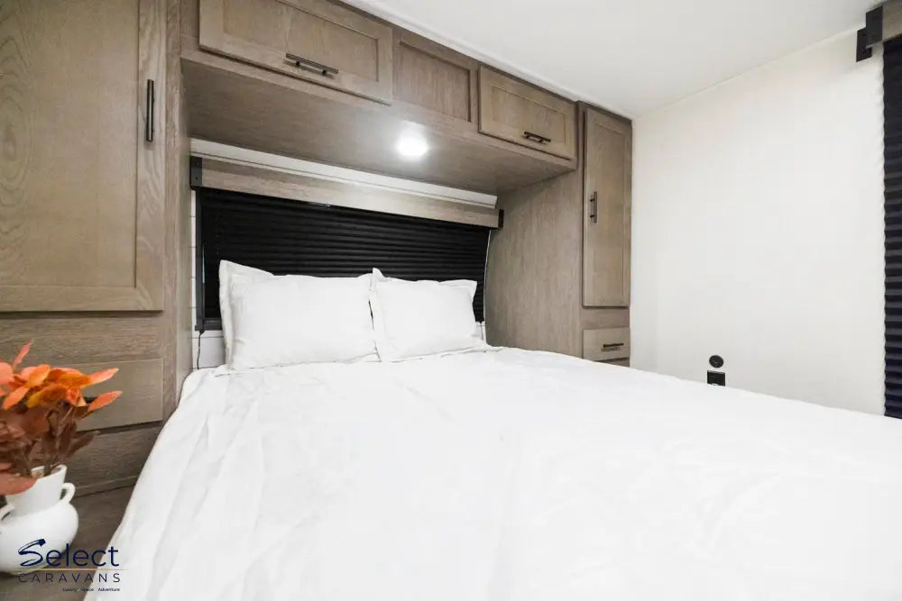 Alpha Wolf 21RB interior – queen bed and rear bathroom caravan layout – Select Caravans NZ