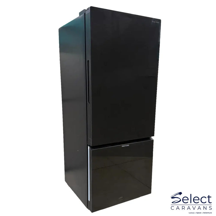 Black refrigerator on a white background